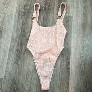 ASOS South Beach X Natalya Wright Exclusive crinkle body swimsuit in rose pink